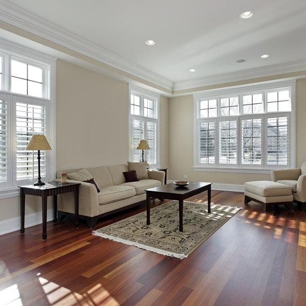 laminate floors are made from synthetic materials and is more cost-effective than wood flooring